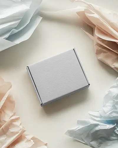 soft-pastel-packaging-box-mockup-surrounded-by-crumpled-tissue-paper-for-gifting-aesthetic