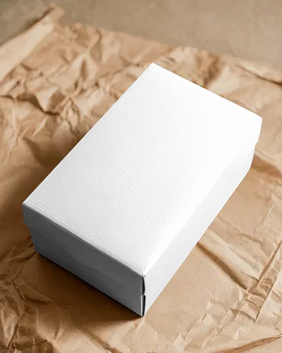 rustic-paper-backdrop-box-mockup-with-textured-lid-design-in-natural-warm-lighting-style
