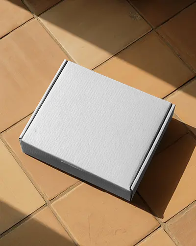 sunlit-terracotta-box-mockup-minimalist-packaging-presentation-on-earthy-tiled-floor