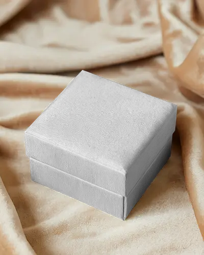 velvet-jewelry-box-mockup-on-soft-golden-fabric-texture-luxurious-elegant-packaging-display