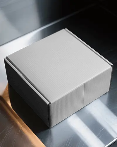 Cardboard Box Mockup On Polished Metal Surface With Light Reflection For Premium Packaging