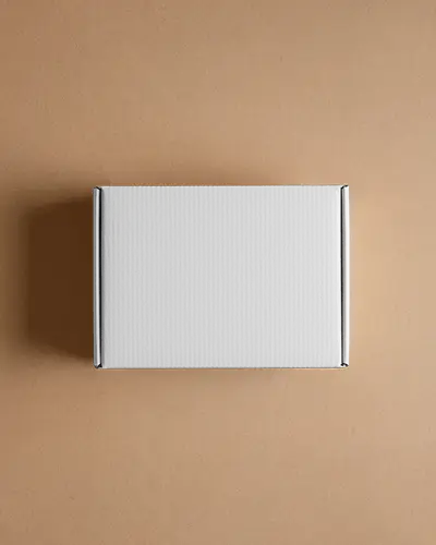 Top View Mailer Box Mockup On Brown Background With Clean Lines For Elegant Brand Packaging
