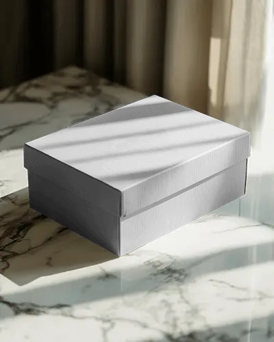 rigid-box-mockup-on-marble-table-with-curtain-shadows-for-luxury-packaging-presentation