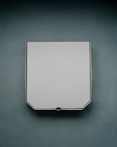 pizza-box-mockup-top-view-on-dark-green-surface-with-clean-minimal-design-style