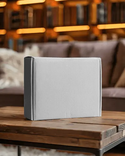 standing-mailer-box-mockup-on-wooden-table-in-cozy-library-room-for-premium-brand-display