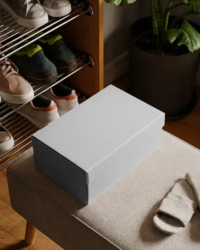 shoebox-style-box-mockup-on-bench-in-entryway-scene-with-sneakers-and-natural-home-setting