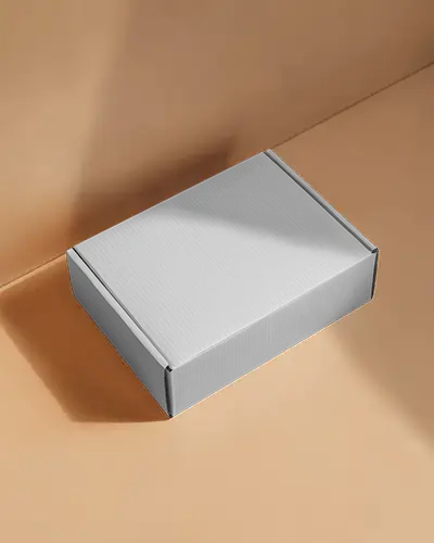 rectangular-box-mockup-on-brown-surface-with-shadows-for-clean-minimal-brand-packaging