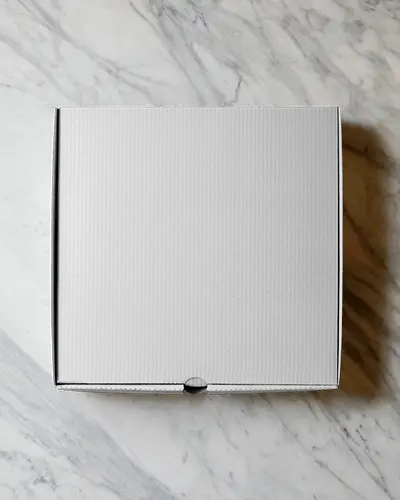 flat-mailer-box-mockup-top-view-on-marble-background-for-elegant-packaging-presentation