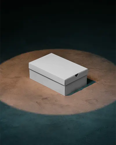 rectangular-box-mockup-in-spotlight-on-dark-studio-floor-for-dramatic-premium-packaging
