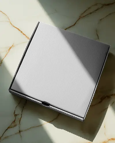 Minimal Square Pizza Box Mockup On White Marble Surface With Sharp Light And Soft Shadows