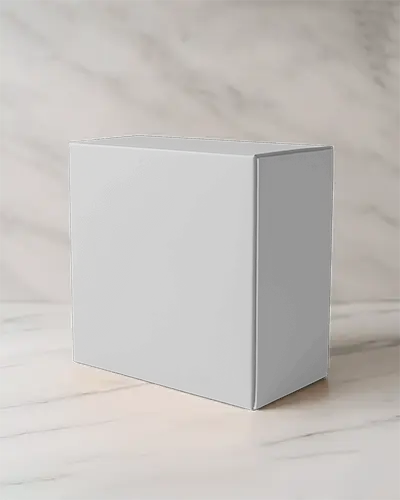 Cuboid Box Mockup On White Marble Surface With Soft Lighting For Luxury Packaging Display