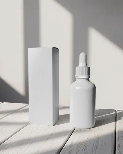 Cosmetic Dropper Bottle And Tall Box Mockup On White Wooden Table With Soft Shadow