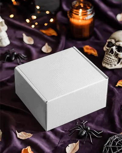 Spooky Halloween Gift Box Mockup With Skulls Candles And Decorative Spiders On Purple Fabric