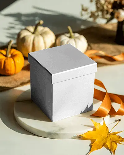 Minimalist Halloween Gift Box Mockup With Pumpkin And Fall Leaf Decor Perfect For Seasonal Branding