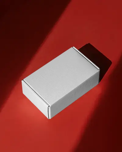 Luxe Red Studio Box Mockup Elegant Mailer Cast In Dramatic Directional Light