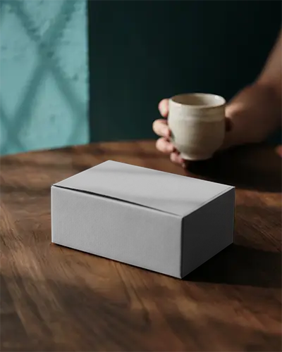 Minimalistic Plain Box Mockup On Wooden Surface For Product Packaging And Brand Presentation