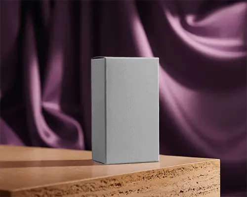 Luxury Rectangular Packaging Box Mockup On Marble Surface With Satin Curtain Background