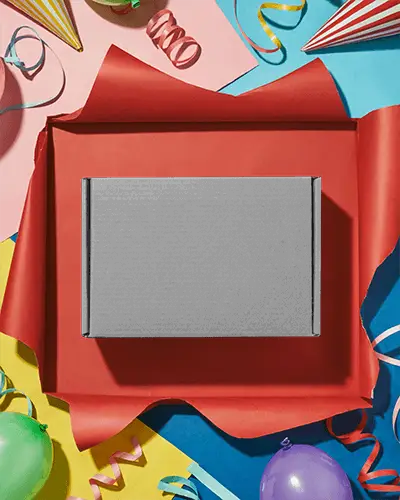 Premium Gift Box Mockup With Party Decorations Ideal For Branding And Packaging Design Presentations