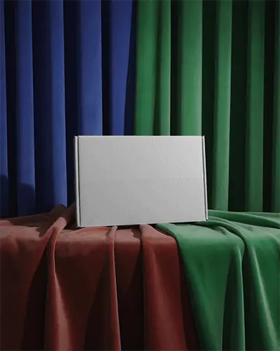 Sleek Rectangular Box Mockup Placed On Textured Fabric Background For Brand Packaging Display