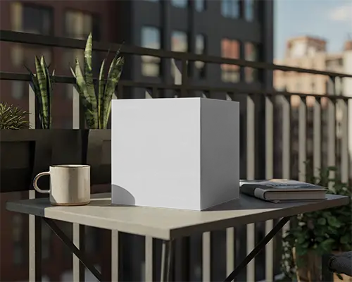 Outdoor Minimalist Box Mockup On Balcony Table With Coffee Cup And Magazine Scene