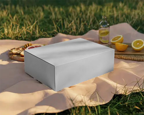 Sleek Closed Corrugated Box Mockup On Outdoor Picnic Setting For Branding Design Showcase