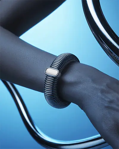 Futuristic Metal Bracelet Mockup On Wrist With Cool Blue Light And Chrome Elements