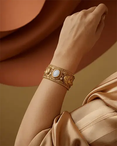 Ornate Gold Bracelet Mockup On Wrist With Classic Engraved Details In Warm Studio Light