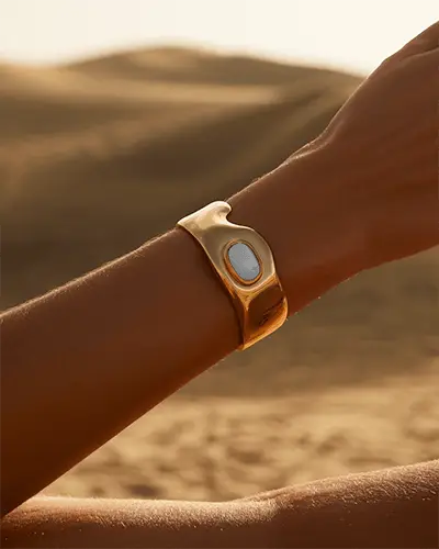 Sunlit Gold Cuff Bracelet Mockup On Wrist In Warm Desert Landscape