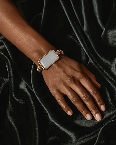 Elegant Gold Bracelet Mockup With Rectangular Face On Rich Velvet Backdrop