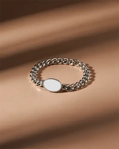 Silver Chain Bracelet Mockup With Oval Plate On Warm Soft Shadow Surface For Premium Branding