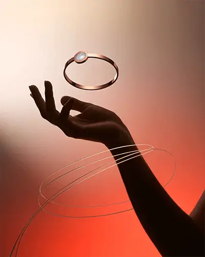 Ethereal Rose Gold Bracelet Mockup Floating Above Hand In Warm Glowing Light