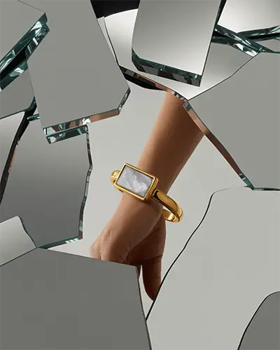 Gold Statement Bracelet Mockup Through Broken Mirror Fragments