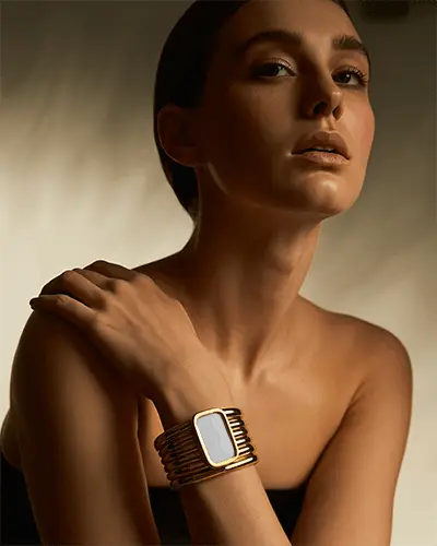 Elegant Fashion Bracelet Mockup On Female Model In Soft Golden Studio Lighting