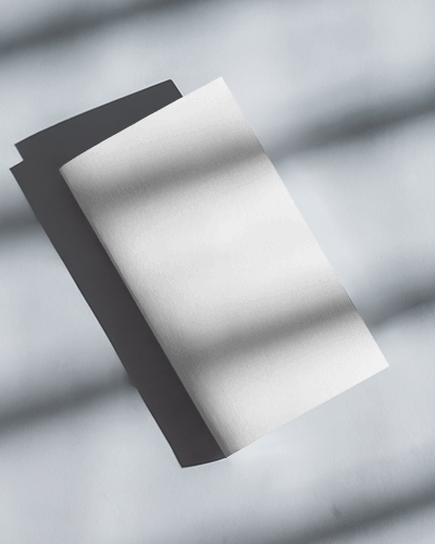 Brochure Mockup On Patterned Surface With Angled Presentation