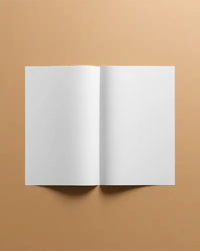 Flat Lay Open Brochure Mockup On Warm Peach Surface With Even Lighting