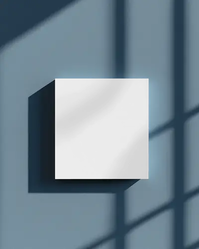 Square Brochure Mockup On Blue Wall With Window Shadows Clean And Modern Lighting