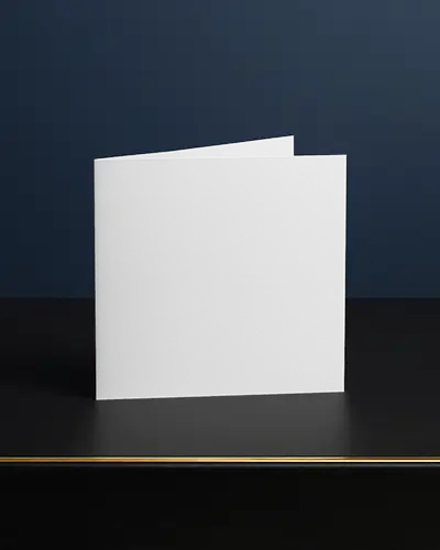 Standing Folded Brochure Mockup On Black Table With Navy Background And Elegant Light