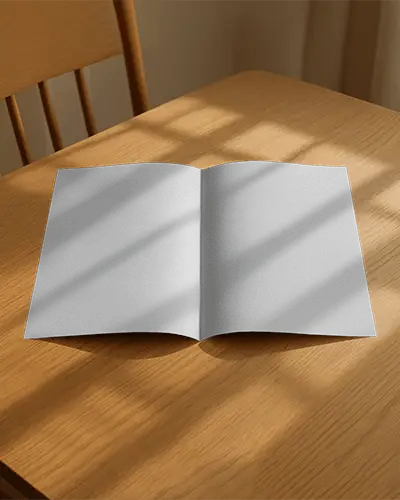 Bifold Brochure Mockup On Wooden Table With Soft Shadows Cozy Home Lighting Vibe