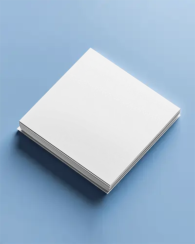 Stacked Square Brochure Mockup On Light Blue Surface Thick Paper Depth Clean Perspective