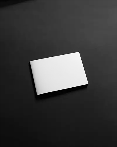 Landscape Brochure Mockup Centered On Black Textured Background With Subtle Shadow Play