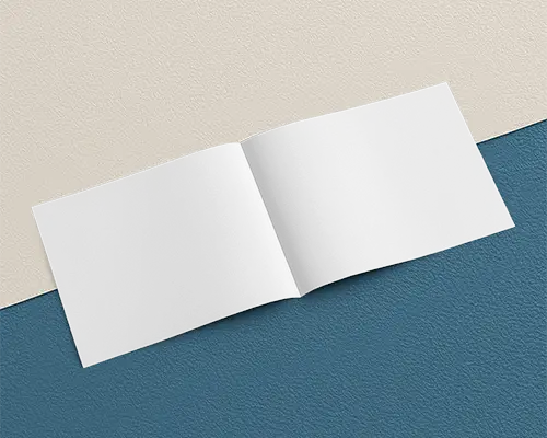 Open Landscape Brochure Mockup On Cream And Blue Textured Background With Balanced Soft Light