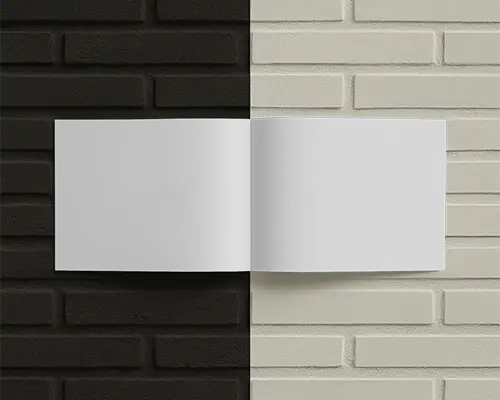 Minimal Open Landscape Brochure Mockup Against Two Tone Brick Wall Backdrop With Flat Lighting