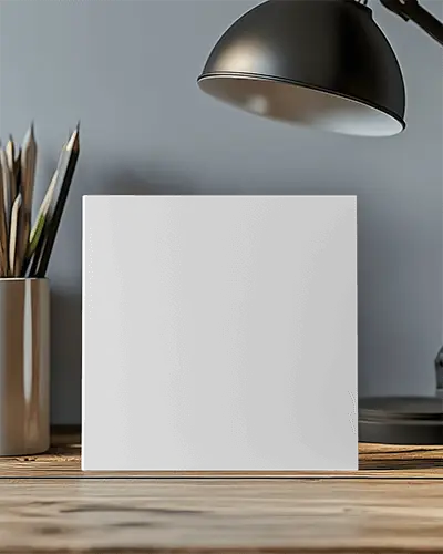 Square Brochure Mockup On Wooden Desk With Metal Lamp And Pencil Holder Modern Office Environment Soft Lighting Elegant Corporate Presentation Layout