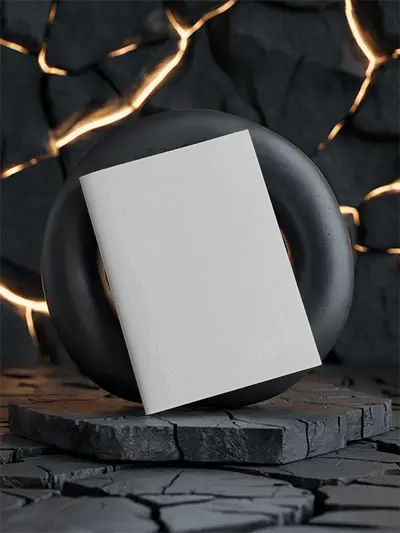 Brochure Mockup Angled On Volcanic Black Rock Surface With Illuminated Crack Lines And Round Support Ring Creative Dark Display Setting