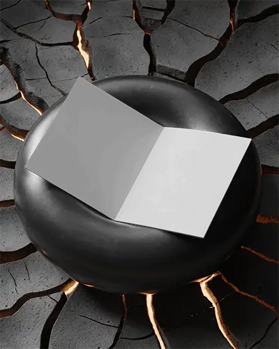 Brochure Mockup Placed On Black Rounded Surface Over Volcanic Textured Ground With Glowing Cracks And Moody Lighting