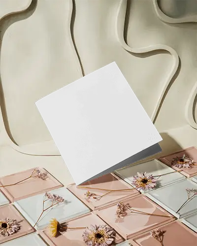 Minimalistic Brochure Mockup Showcasing Clean Design Over Geometric Tile Background