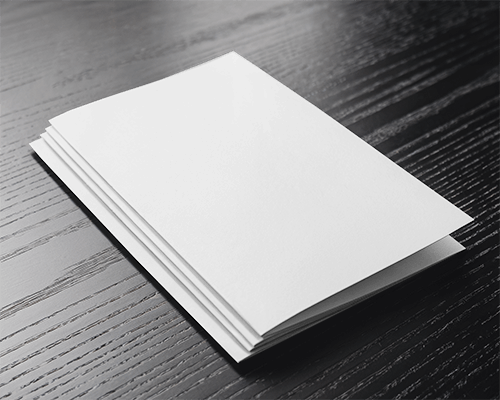 Stacked Brochure Mockup On Dark Wooden Table With Soft Lighting And Clean Minimalistic Design 033