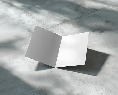 Minimalistic Bifold Brochure Mockup Placed On Rough Floor Casting Detailed Shadows 0394