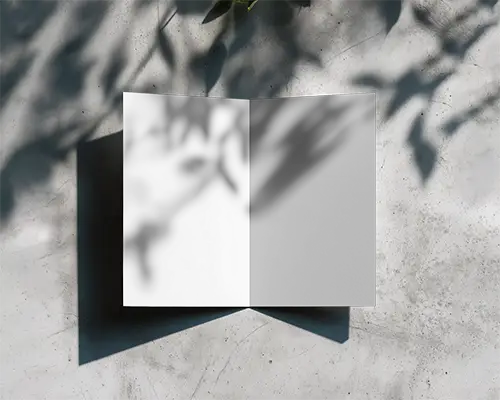 minimalist-open-brochure-mockup-on-textured-surface-with-soft-shadow-play-creative-print-design-0395