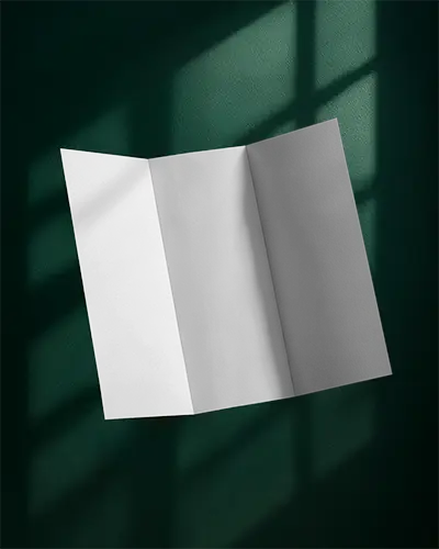 tri-fold-brochure-mockup-flat-lay-on-textured-background-for-design-presentation-0460